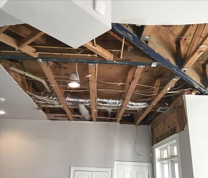 Exposed ceiling, subfloor, drywall, framing