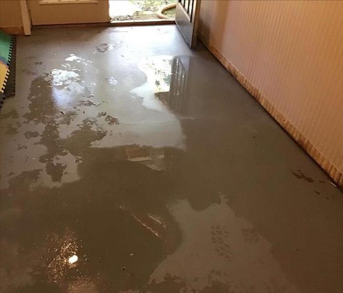 Concrete floors, water damage, wet walls